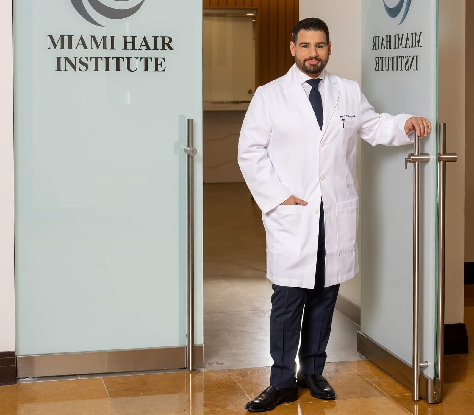 Dr. Aron Nusbuam 